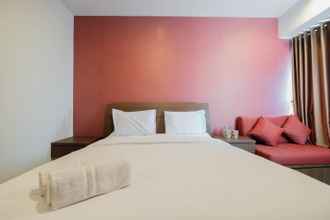 Kamar Tidur 4 Cozy Studio at Grand Kamala Lagoon Apartment By Travelio