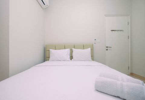 卧室 Cozy and Beautiful 2BR at Springlake Summarecon Bekasi Apartment By Travelio