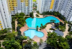 Swimming Pool 7 Relax and Best 2BR Springlake Summarecon Apartment By Travelio