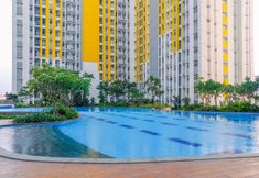 Swimming Pool 7 Modern 2BR for 4 Pax at Springlake Summarecon Apartment By Travelio