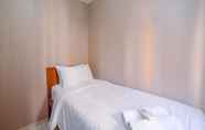 Bedroom 2 Modern 2BR for 4 Pax at Springlake Summarecon Apartment By Travelio