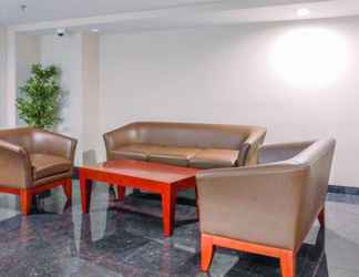 Lobby 2 Modern 2BR for 4 Pax at Springlake Summarecon Apartment By Travelio