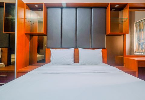 Bedroom Modern 2BR for 4 Pax at Springlake Summarecon Apartment By Travelio