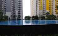 Swimming Pool 7 Cozy and Modern Studio Apartment at Springlake Summarecon Bekasi By Travelio