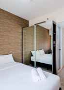 BEDROOM Cozy and Modern Studio Apartment at Springlake Summarecon Bekasi By Travelio