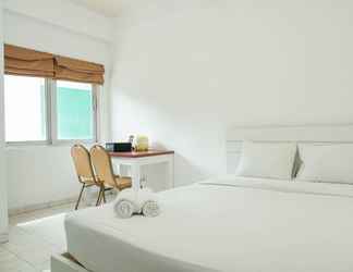 Bedroom 2 Homey and Comfy Studio Margonda Residence 1 Apartment By Travelio
