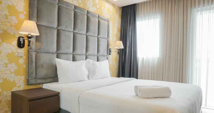 Kamar Tidur Cozy and Warm Studio Apartment at Signature Park Grande By Travelio