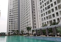Swimming Pool 7 Nice and Comfortable 2BR Apartment at M-Town Residence By Travelio