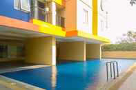 Swimming Pool Fully Furnished 2BR Apartment with Comfortable Design at The Boutique By Travelio