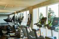 Fitness Center Warm and Comfortable Studio Room at Menteng Park Apartment By Travelio