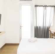 Bilik Tidur 2 Studio Cozy and Homey Apartment at Riverview Jababeka By Travelio