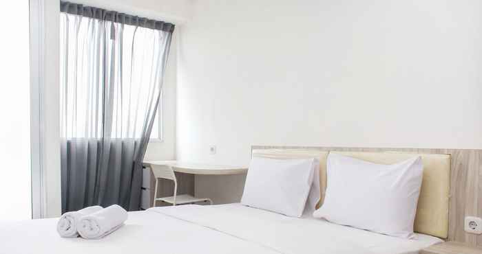 Bedroom Living Comfort Studio Apartment Room at Riverview Jababeka By Travelio