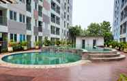 Swimming Pool 6 1BR Living Comfort Apartment at Grand Sentraland Karawang By Travelio