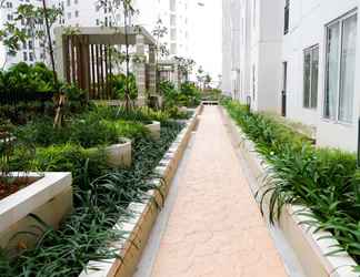 Exterior 2 Nice and White 1BR at Bassura City Apartment By Travelio