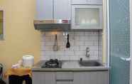 Common Space 4 Homey and Comfort 2BR at Green Pramuka City Apartment By Travelio