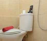 In-room Bathroom 5 Homey and Comfort 2BR at Green Pramuka City Apartment By Travelio