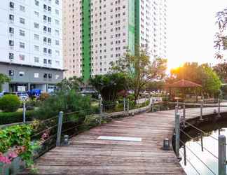 Bangunan 2 Homey and Comfort 2BR at Green Pramuka City Apartment By Travelio