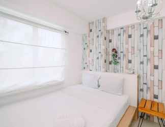 Kamar Tidur 2 Cozy and Warm 2BR at Low Floor Bassura City Apartment By Travelio