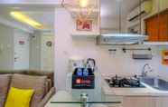 Common Space 4 Cozy and Warm 2BR at Low Floor Bassura City Apartment By Travelio