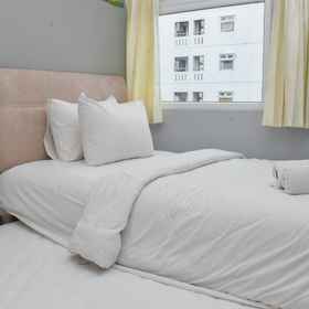 Bedroom 1 2BR Cozy Living and Nice at Green Pramuka City Apartment By Travelio, Rawamangun Golf Course Hotels