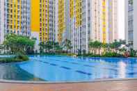 Swimming Pool Comfort Living 2BR Apartment at Springlake Summarecon Bekasi By Travelio
