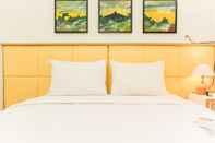 Kamar Tidur Elegant and Nice 1BR Apartment at Mustika Golf Residence By Travelio