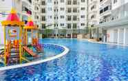 Swimming Pool 7 2BR Minimalist and Cozy Apartment @ Signature Park Grande By Travelio