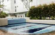 Swimming Pool 7 Apartment 2BR Enjoy Jakarta Bassura City By Travelio 