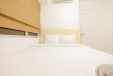 Phòng ngủ Apartment 2BR Enjoy Jakarta Bassura City By Travelio