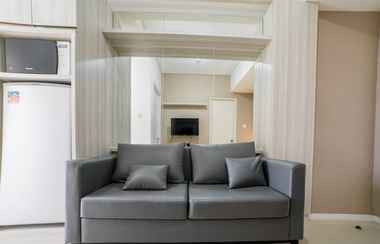 Lobby 2 1BR Cozy Apartment at Parahyangan Residence By Travelio