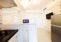 Ruang Umum 4 2BR Apartment with City View at Bassura City By Travelio