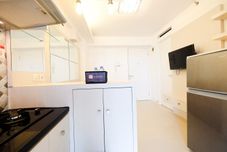 Ruang Umum 2BR Apartment with City View at Bassura City By Travelio