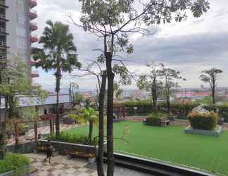 Bangunan 2 Comfort 2BR Apartment at Vida View Makassar By Travelio