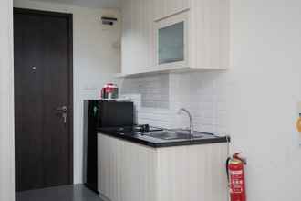 Common Space 4 Cozy and Warm Studio Bintaro Icon Apartment By Travelio