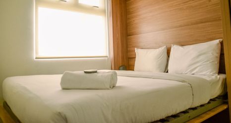 Phòng ngủ 2 Simple and Comfort 2BR at Green Pramuka City Apartment By Travelio