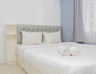 Bedroom 2 Comfort Living 2BR Apartment at Bassura City By Travelio