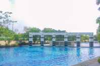 Swimming Pool Comfy and Exclusive 3BR at The Summit Apartment Kelapa Gading By Travelio