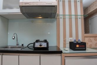Common Space 4 Comfort Living 1BR Apartment at Green Pramuka City By Travelio