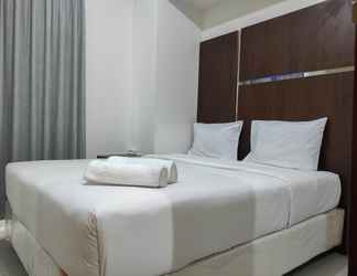 Kamar Tidur 2 Cozy and Chic 2BR at Vida View Apartment By Travelio