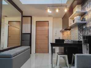 Ruang Umum 4 Cozy and Chic 2BR at Vida View Apartment By Travelio