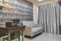 Lobby Cozy and Chic 2BR at Vida View Apartment By Travelio