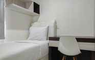 Bilik Tidur 2 Cozy and Chic 2BR at Vida View Apartment By Travelio