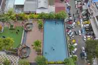 Swimming Pool Cozy and Chic 2BR at Vida View Apartment By Travelio