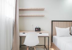 Common Space 2 Cozy and Nice Studio at Evenciio Margonda Apartment By Travelio