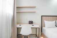Common Space Cozy and Nice Studio at Evenciio Margonda Apartment By Travelio