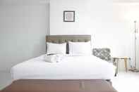 Kamar Tidur Modern and Spacious Studio Room Apartment at Grand Asia Afrika By Travelio