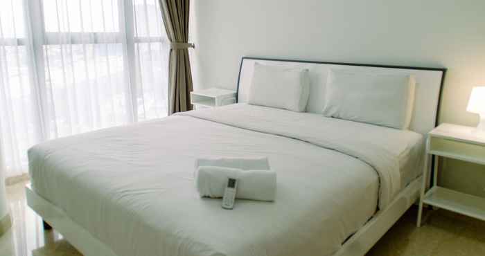 Kamar Tidur Spacious and Comfort 2BR at Gold Coast Apartment By Travelio