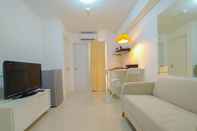 Common Space Simply and Cozy Living 2BR at Bassura City Apartment By Travelio