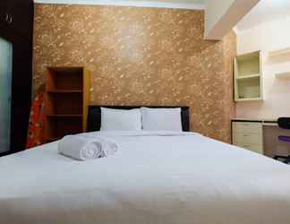 Bedroom 2 2BR Apartment with City View at Sudirman Park By Travelio