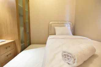 Bedroom 4 Relaxing 2BR Apartment at Sudirman Park By Travelio